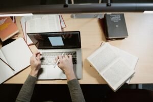 Student researching how to contact professors for PhD funding