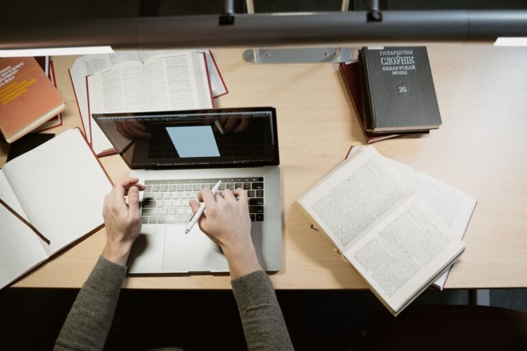 Student researching how to contact professors for PhD funding